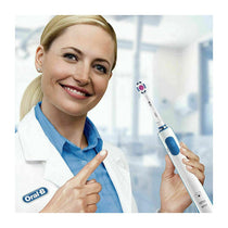 Oral-B Pro 570 3D Cross Action Electric Toothbrush With Rotating Tooth Brush Heads - White