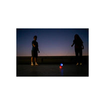 Waboba LED Bounceback Moon Ball With Wrist Strap High-Bounce Tether Ball Motion-Activated Lights Red