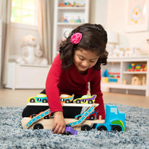 Melissa & Doug Mega Race-Car Carrier - Wooden Tractor and Trailer With 6 Unique Race Cars